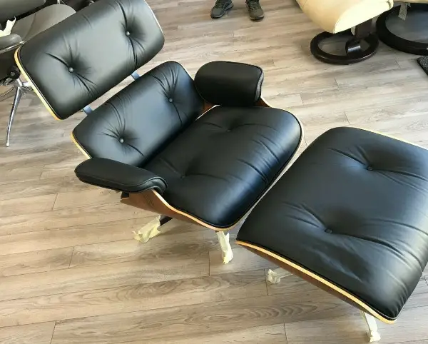 Herman Miller Eames Lounge Chair - Palisander - schwarzes Leder