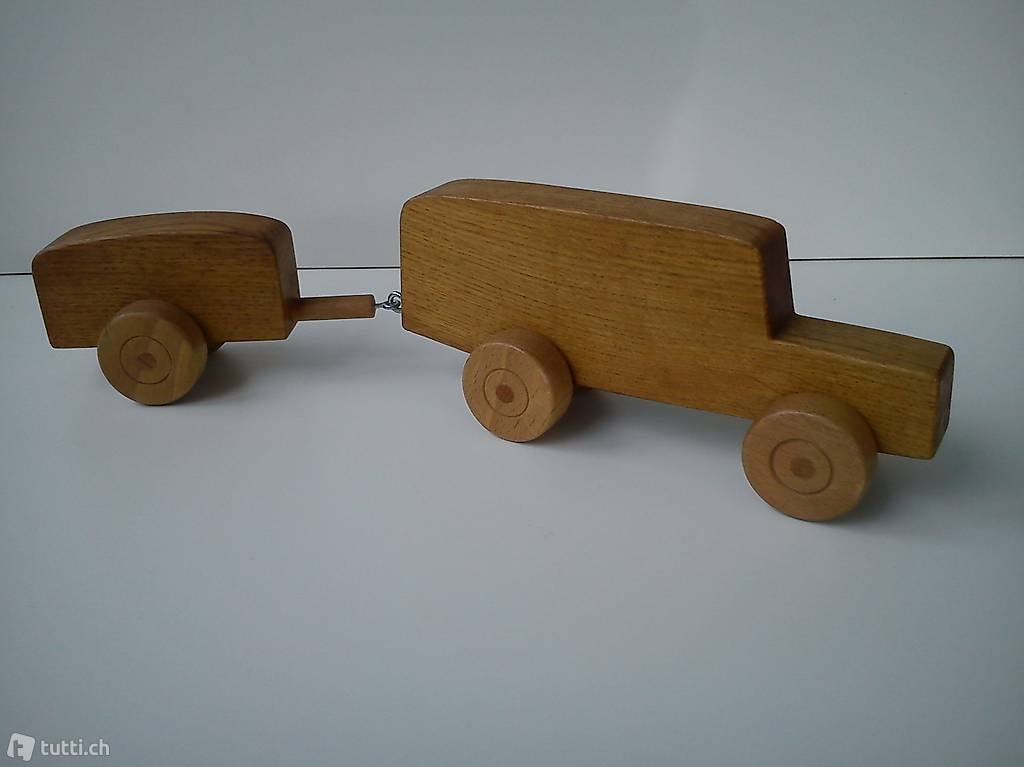 Altes Holzspielzeug Postauto mit Gepäckanhänger